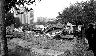 對公園選址的5.5萬多平方米的違章建筑進行拆除。