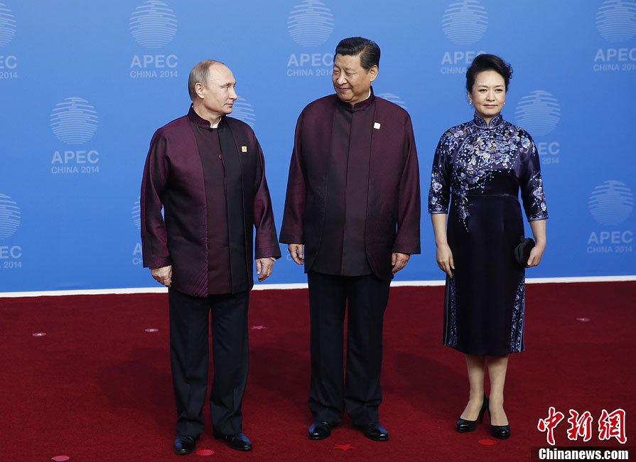 圖為習(xí)近平夫婦歡迎俄羅斯總統(tǒng)普京。中新社發(fā) 杜洋 攝