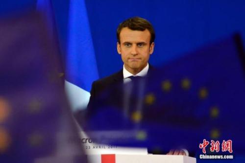 圖為馬克龍?jiān)趹c祝集會(huì)上。中新社記者 龍劍武 攝